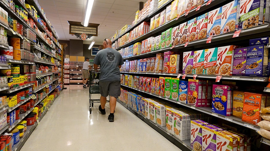 A shopper is seen in a grocery store 